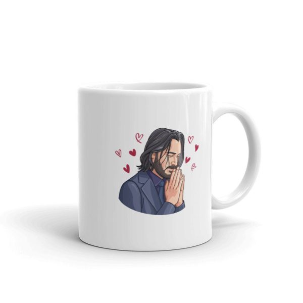 Close-up of glossy white ceramic Keanu artwork on mug