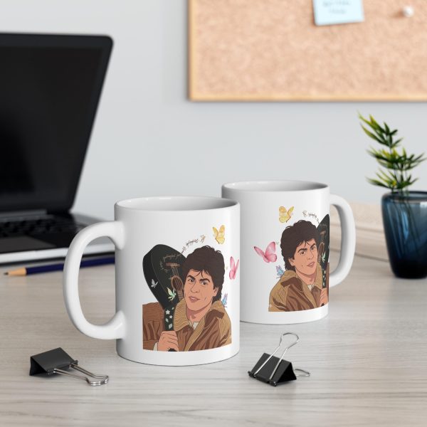 Close-up of Raj guitar illustration on white ceramic mug