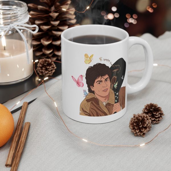 Side view of Bollywood DDLJ mug, butterfly detail near handle