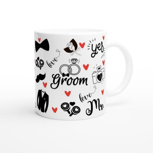 Close-up of groom to be mug artwork, wedding week coffee cup