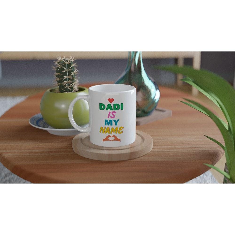 Close-up of vivid colors on glossy ceramic Dadi Nani coffee mug