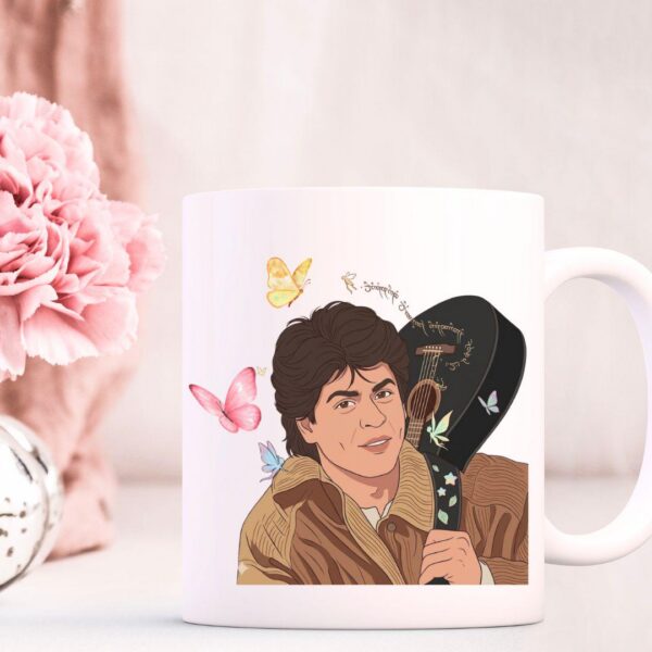 DDLJ inspired mug with illustrated Raj guitar scene and butterfly motifs on white ceramic