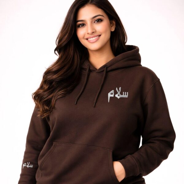 Unisex Arabic calligraphy hoodie laid flat showing full front design by Artkins