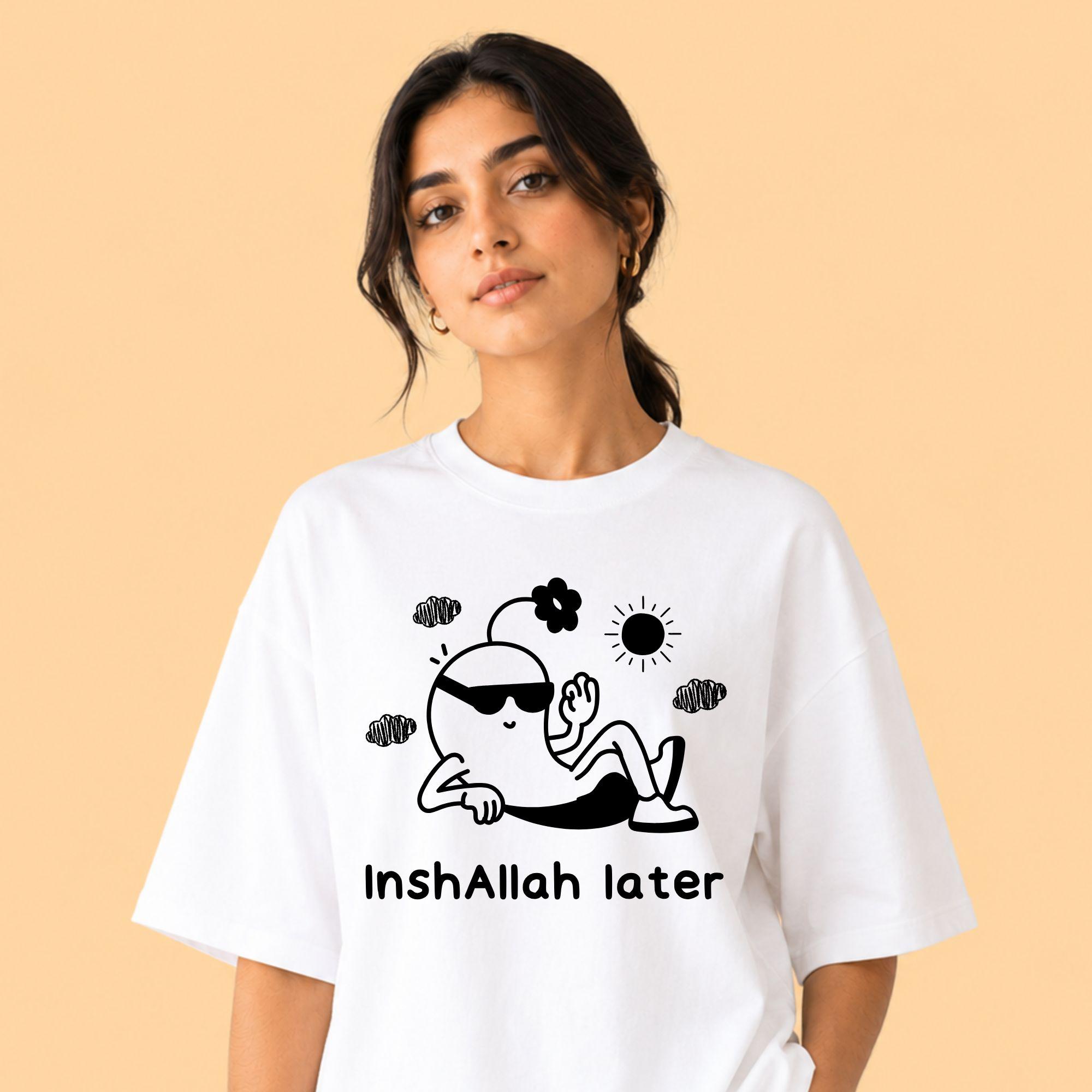 Inshallah Later shirt with relaxed cartoon character graphic, front view on white background